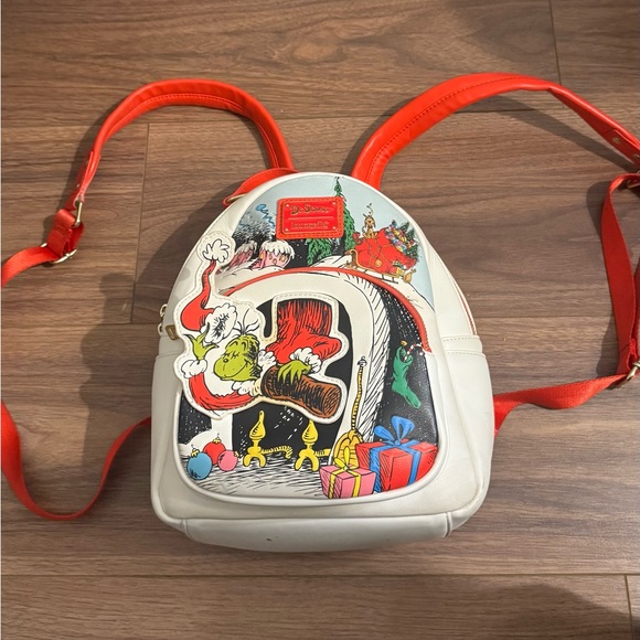 Loungefly Handbags - Loungefly Cream & Red Grinch Holiday Mini Backpack